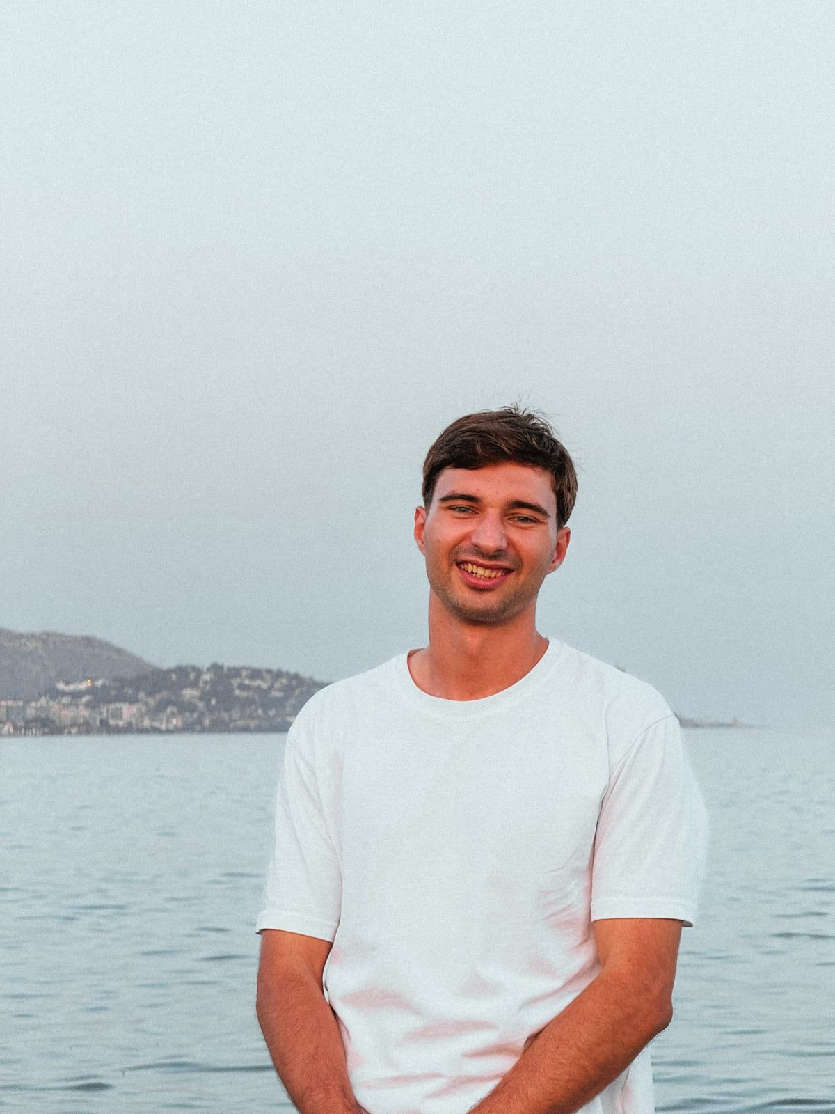 Serhii Kopytchuk smiling by the sea